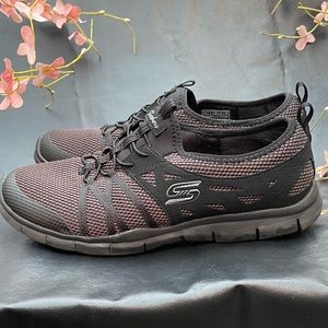 Skechers Woman’s Black Running Shoes size 10